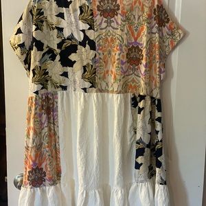 **Never worn**Baby doll dress or can be worn as a beach cover up. Brand new